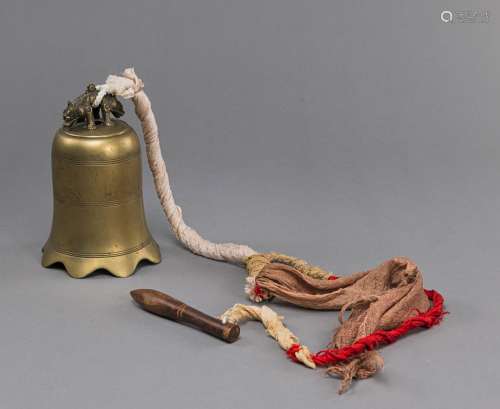 A BRONZE BELL WITH DRAGON HANDLE AND WOODEN BAR