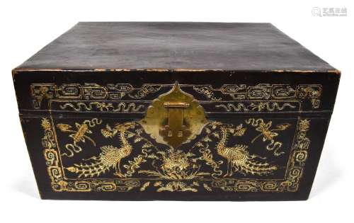 A LEATHER CHEST WITH INLAID PEACOCK DECORATION