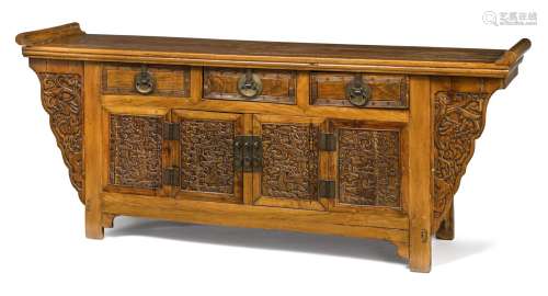 A SIDE CHEST WITH THREE DRAWERS AND DRAGON RELIEF DOORS