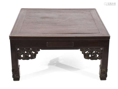 A SQUARE FOUR-DRAWER LOW WOOD TABLE
