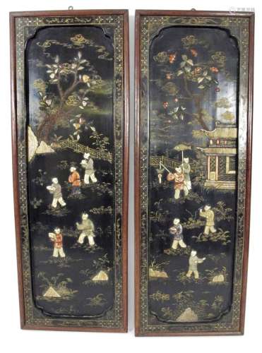 TWO FRAMED SOAPSTONE-INLAID 'PLAYING CHILDREN' WOO...
