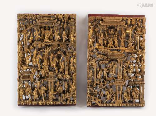 A PAIR OF GILT-WOOD CARVINGS WITH FINE FIGURAL SCENES