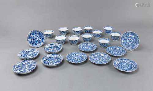 A SET OF ELEVEN BLUE AND WHITE PORCELAIN CUPS AND SAUCERS