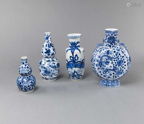 TWO BLUE AND WHITE PORCELAIN DOUBLE-GOURD SHAPED VASES, A MO...