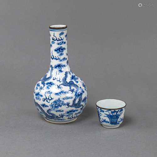 A BLUE AND WHITE PORCELAIN DRAGON VASE AND A SMALL CUP