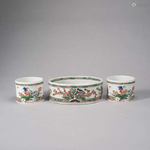 A PAIR OF POLYCHROME PORCELAIN 'BIRDS' CACHEPOTS A...