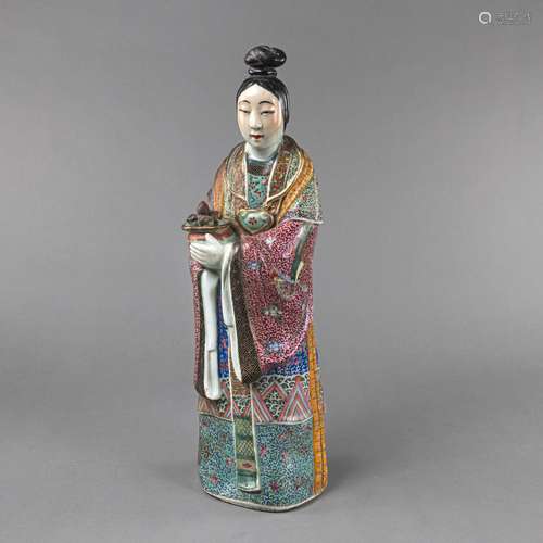 A POLYCHROME ENAMELED PORCELAIN FIGURE OF MA GU WITH A PEACH...