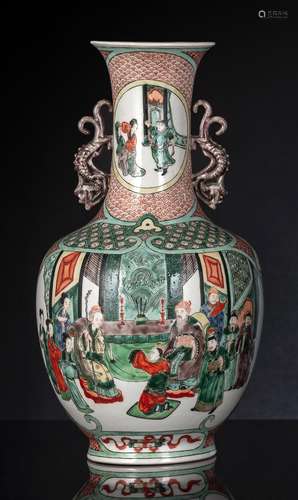 A 'FAMILLE VERTE' VASE WITH HANDLES DEPICTING THEA...