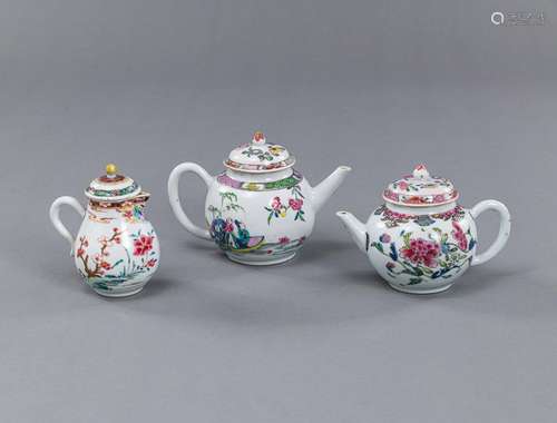 TWO SMALL PORCELAIN TEAPOTS AND A MILK JUG, DECORATED WITH &...