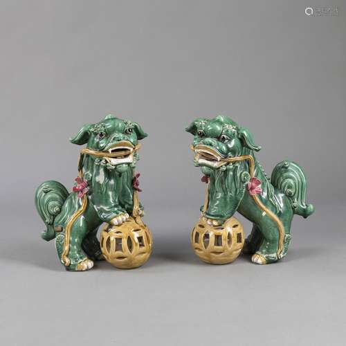 TWO LARGE POLYCHROME PORCELAIN FO LIONS