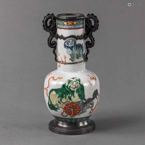 A FAMILLE VERTE BUDDHIST LION VASE WITH EUROPEAN SILVER MOUN...