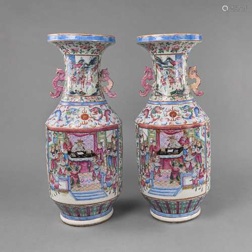 A PAIR OF 'FAMILLE ROSE' HANDLE VASES WITH DECORAT...