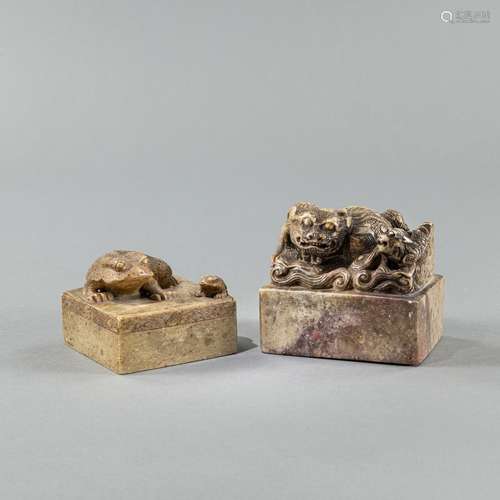 TWO SOAPSTONE SEALS WITH SHISHI AND TOAD CARVINGS