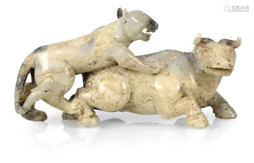 A JADE CARVING OF A LEOPARD ATTACKING A BUFFALO