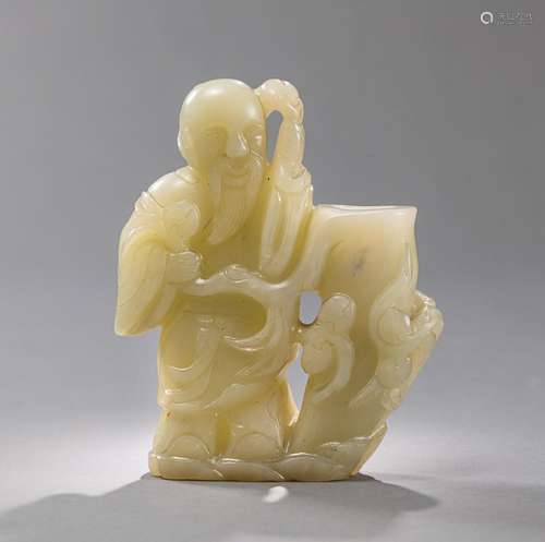 A JADE VASE WITH IMMORTAL AND PEACH BRANCHES