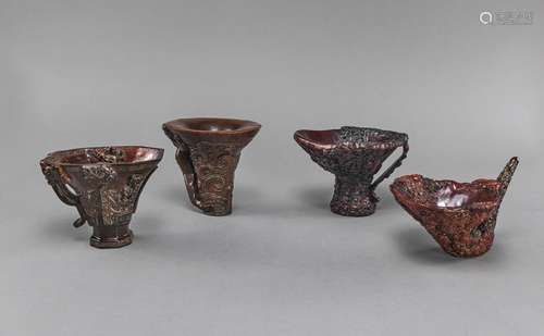 FOUR RICHLY DECORATED LIBATION CUPS