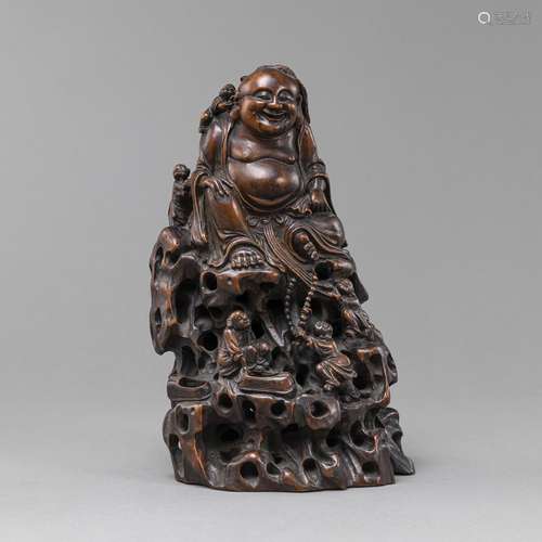 A BAMBOO CARVING OF BUDAI ACCOMPANIED BY BOYS