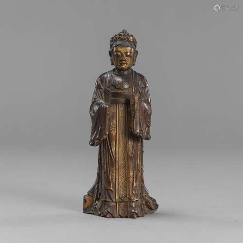 A SMALL CARVED WOOD FIGURE OF AN OFFICIAL