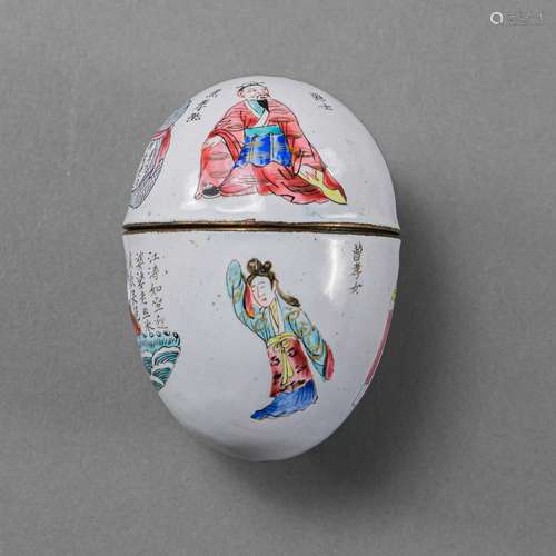 AN UNUSUAL EGG-FORMED CANTON ENAMEL BOX AND COVER WITH INSCR...