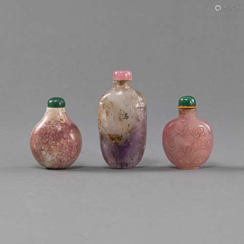 THREE QUARTZ SNUFFBOTTLES PARTIALLY WITH CARVED FLORAL DESIG...