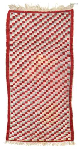 A “CHECKERBOARD” RUG