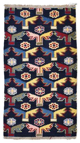 A CHINESE/TIBETIAN RUG