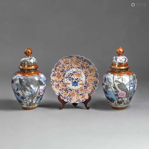 A PAIR OF LARGE KUTANI STYLE PORCELAIN COVERED VASES WITH FL...