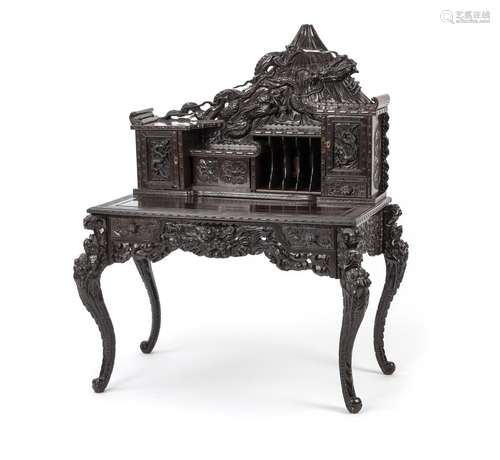 A CARVED WOOD DRAGON WRITING DESK