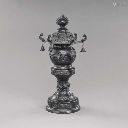 A THREE-PART BRONZE LANTERN (TORO), PARTLY IN OPENWORK, DECO...