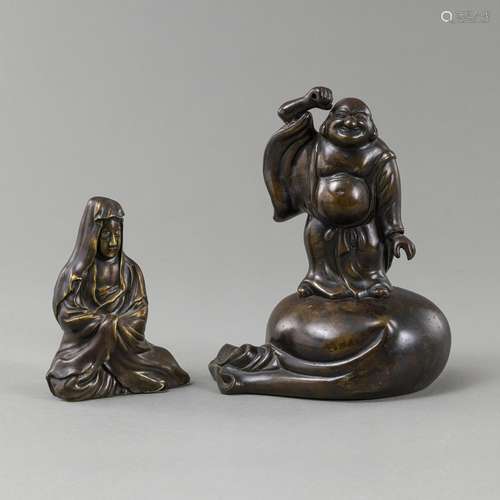 TWO BRONZE FIGURES OF A SEATED KANNON AND HOTEI STANDING ON ...