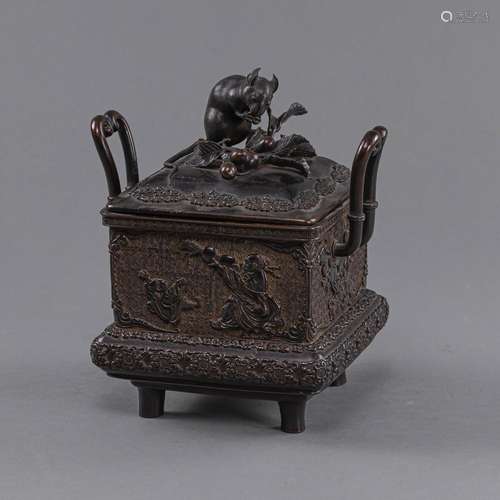 A RECTANGULAR CAST BRONZE VESSEL AND COVER WITH RELIEF DECOR...