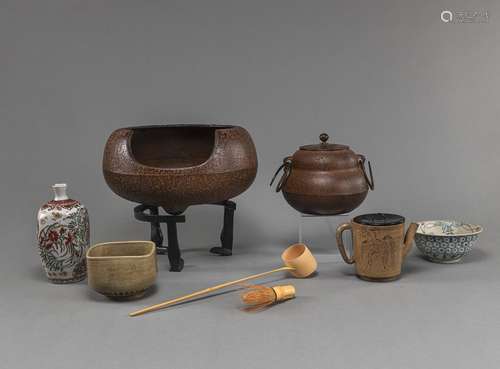 A GROUP OF TEA CEREMONY UTENESILS WITH IRON HIBACHI AND CHAG...