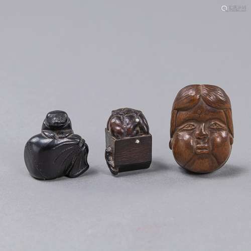 A GROUP OF FIVE WOOD/CORAL NETSUKE