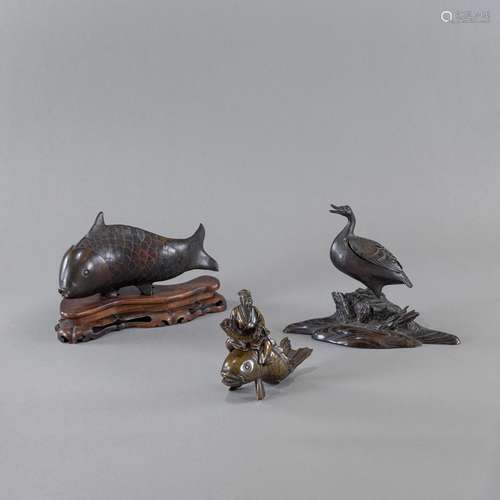 A BRONZE MODEL OF A CARP AND TWO BRONZE FISH AND GOOSE CENSE...