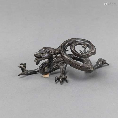 A BRONZE DRAGON BRUSHREST