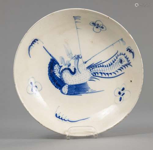 A BLUE AND WHITE PHOENIX DISH