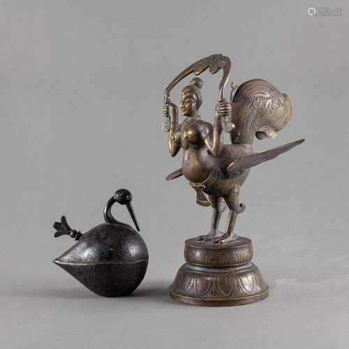 A BRONZE KINARA AND A BIRD-SHAPED VESSEL