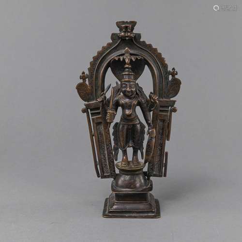 A BRONZE FIGURE OF FOUR-ARMED VISHNU