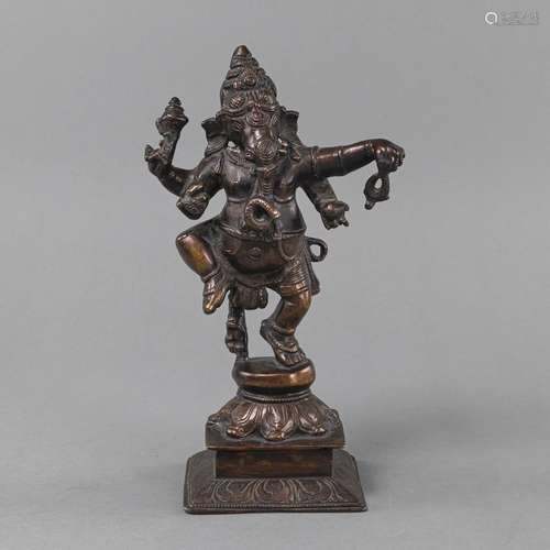 A BRONZE FIGURE OF DANCING GANESHA