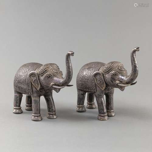 TWO METAL-FITTED ELEPHANTS SCULPTURES