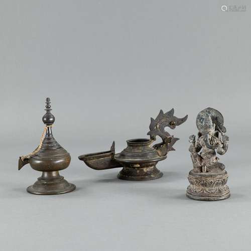 A BRONZE FIGURE OF GANESHA, AN OIL LAMP, AND A STUPA