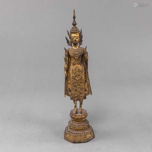 A GILT-BRONZE FIGURE OF STANDING BUDDHA