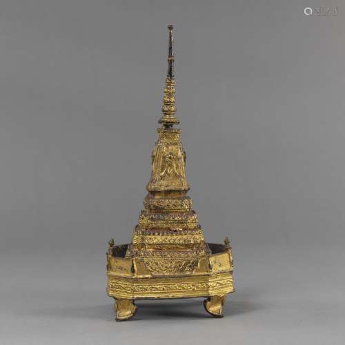 A GILT-BRONZE STUPA