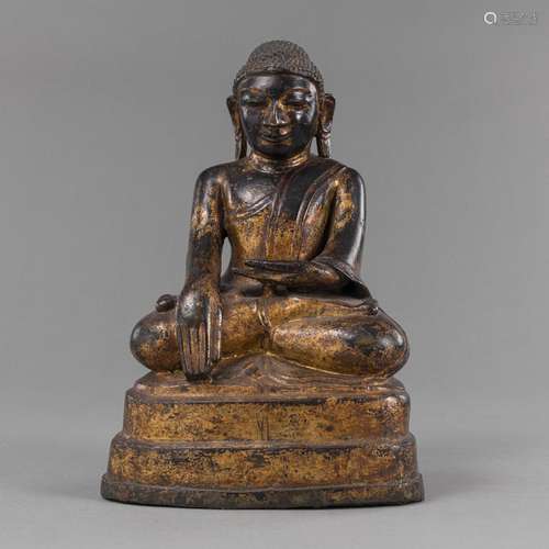 A GILT-BRONZE FIGURE OF BUDDHA MARAVIJAYA