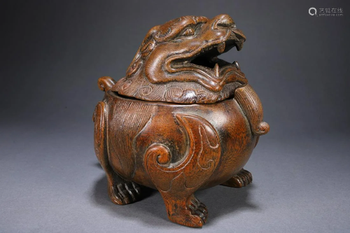 An Unusual Bamboo Carved Lion Ornament