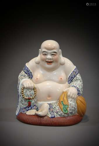 A 20th-century Chinese porcelain Buddha statue