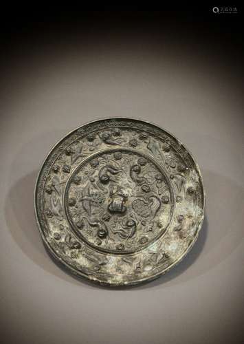 A Chinese bronze mirror from the 8th to the 9th century