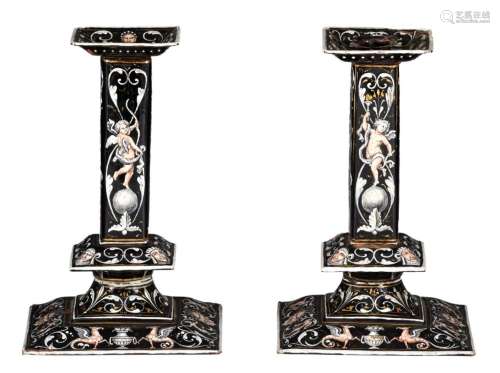 A pair of 17thC Limoges enamel candlesticks, H 23 cm (+)