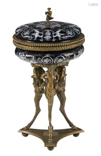 A Limoges grisaille enamel tazza with cover, on a brass trip...