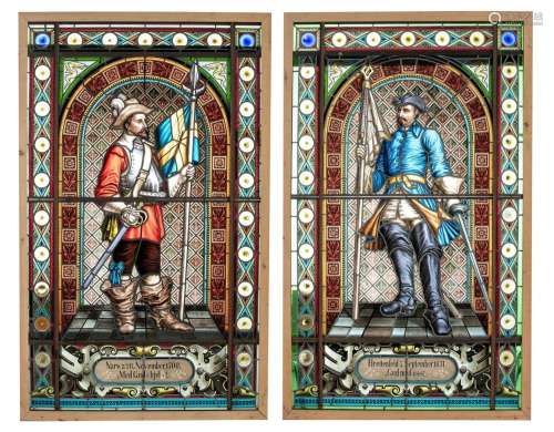 A pair of leaded windows depicting two historical battles in...